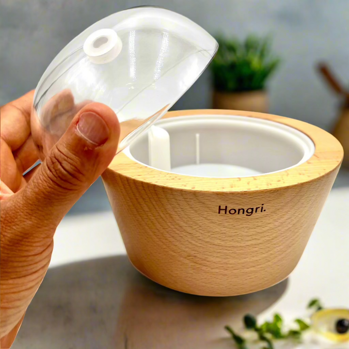 The UNA Wooden Essential Oil Diffuser brings the tranquility of nature into your home or office. Featuring a sleek wooden design, automatic shut-off, and intermittent misting, it ensures a consistent and safe aromatherapy experience. Compatible with essential and fragrance oils for ultimate relaxation.