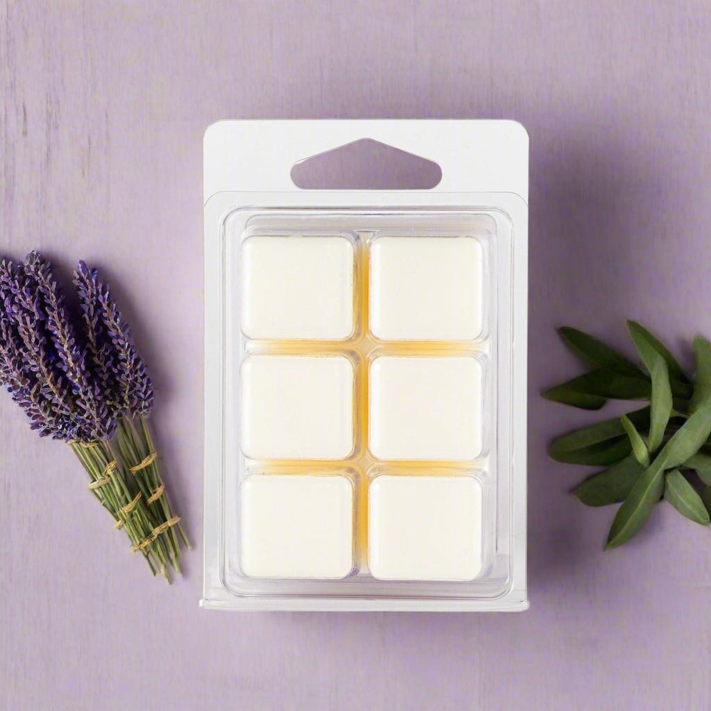 Pack of wax melts with lavender and greenery on a purple background