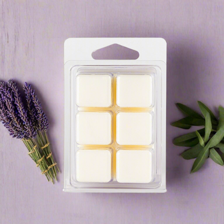 Pack of wax melts with lavender and greenery on a purple background