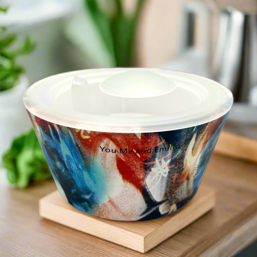 plastic bowl with colorful abstract design and 'You Me and Emily' branding on a white background