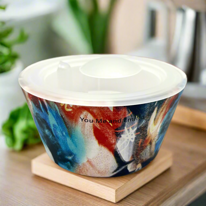 plastic bowl with colorful abstract design and 'You Me and Emily' branding on a white background