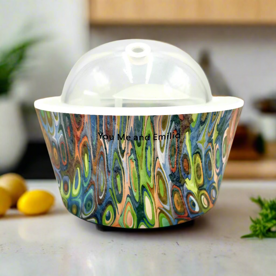 Colorful patterned container with a clear dome lid on a white background