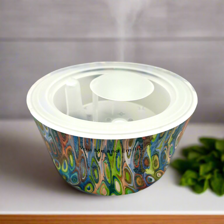Colorful pet food bowl with a pattern on a white background
