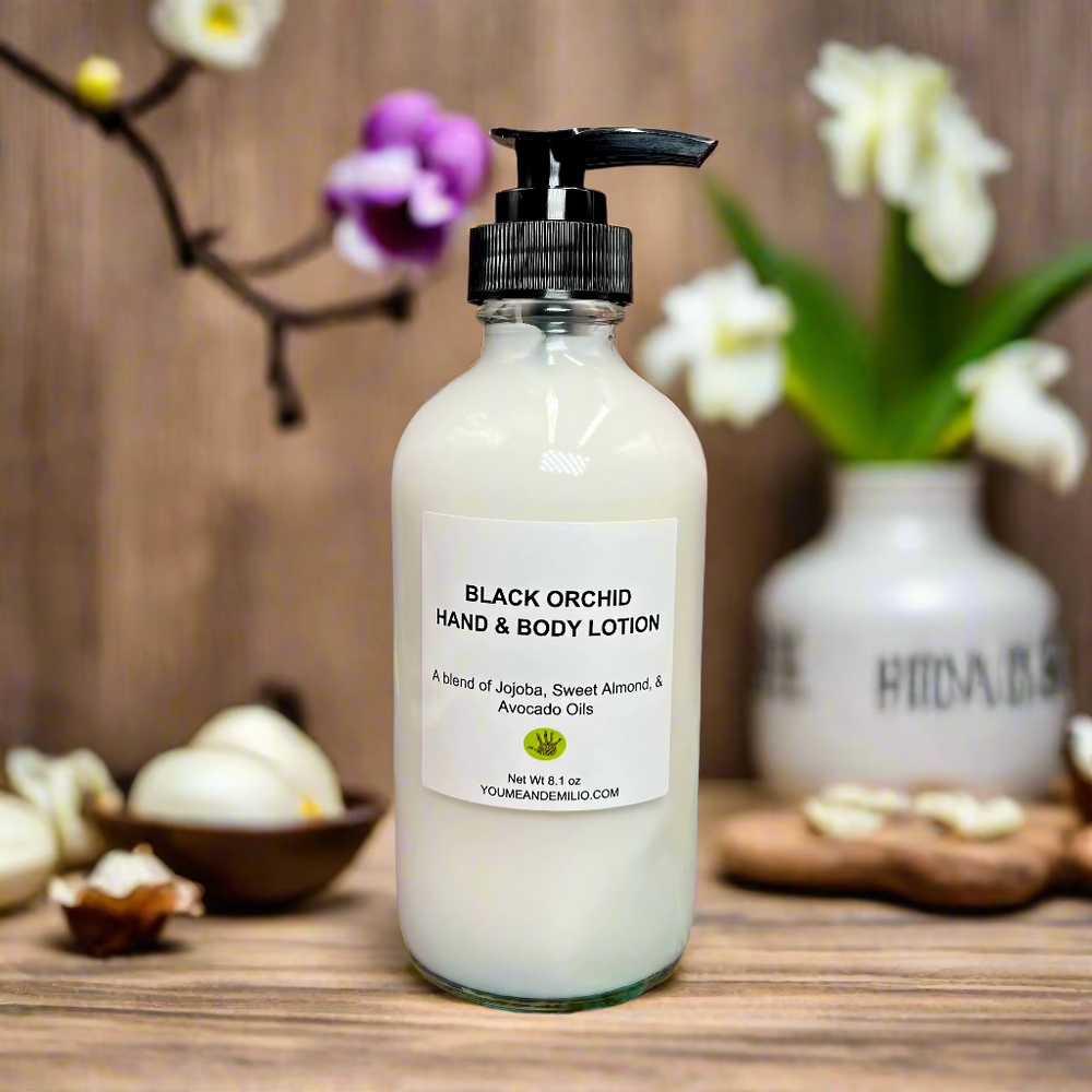 A bottle of Orchid Hand & Body Lotion with an elegant design, infused with night-blooming Orchids, Jasmine, and Water Lilies for a luxurious experience.