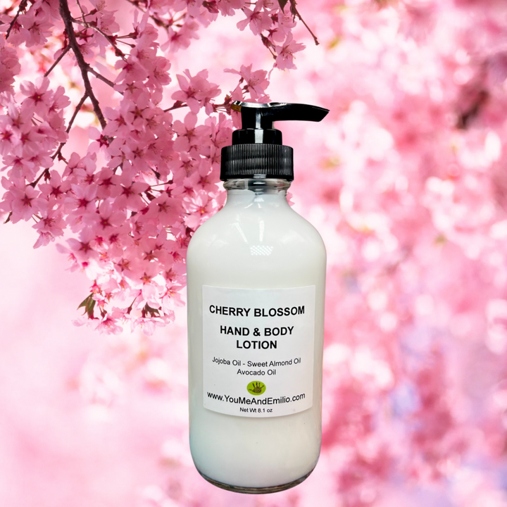 Cherry Blossom Hand & Body Lotion in a serene setting with soft petals and a hint of cherry blossoms, reflecting its soothing and hydrating benefits.