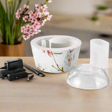 Cherry Blossom Essential Oil Diffuser with a 260ml water tank and a gentle mist rising in an elegant display.