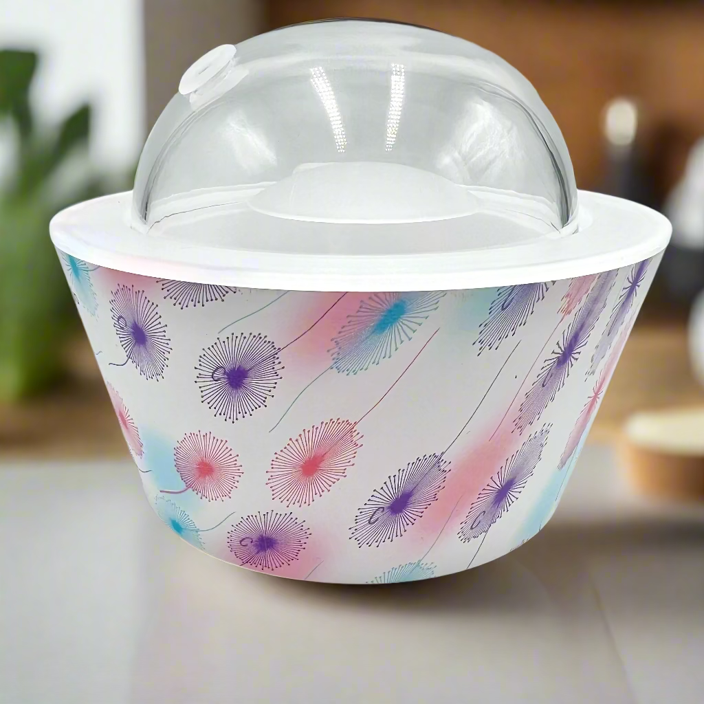 Container with floral pattern and clear lid on a white background