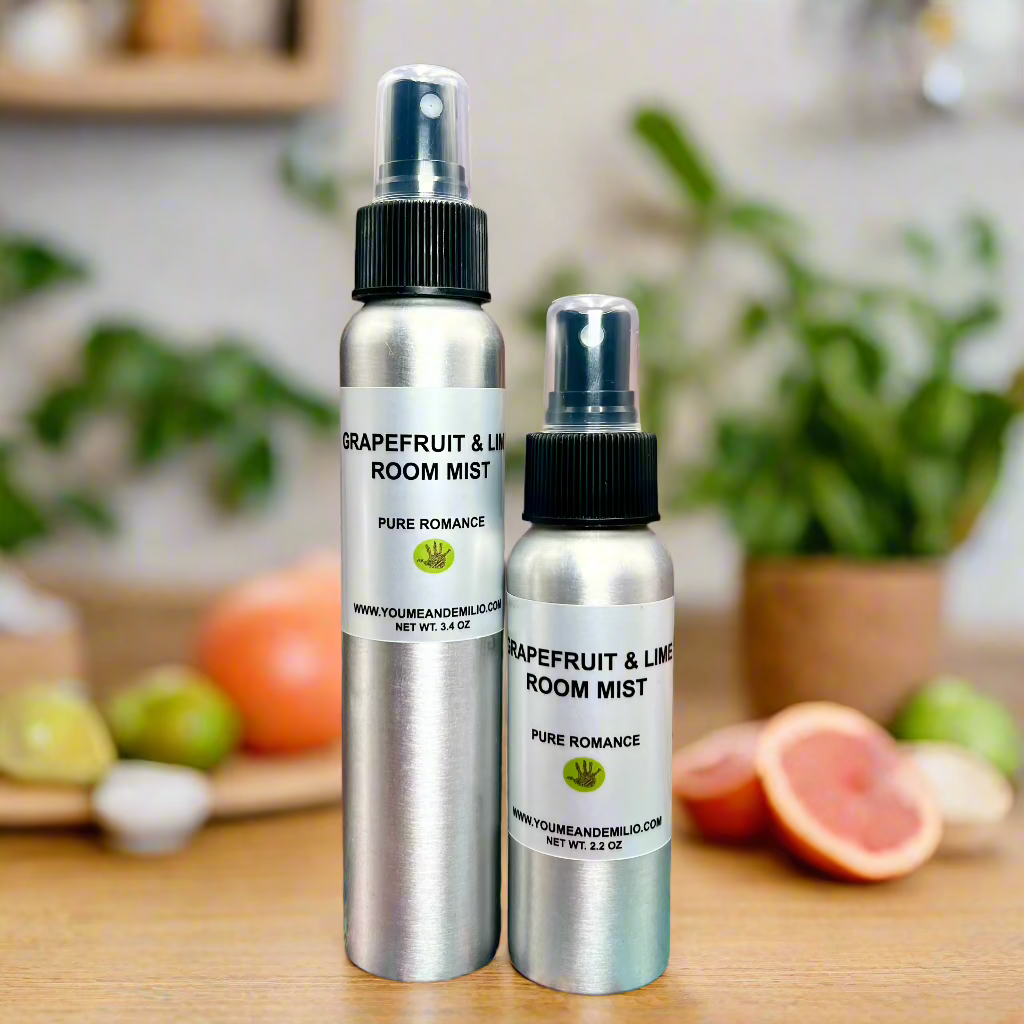 A refreshing spray of Grapefruit & Lime Room Mist dispersing in the air, filling the space with a zesty and uplifting aroma.