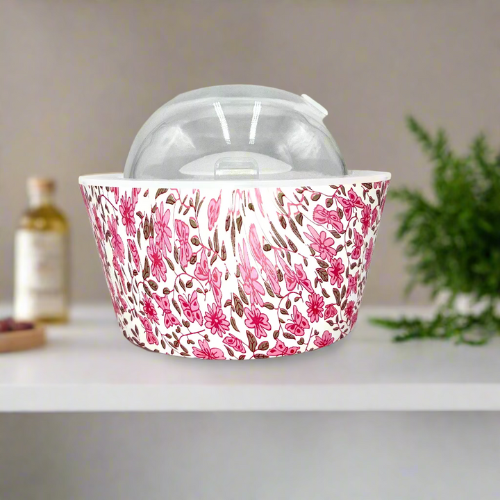 Decorative container with pink floral pattern on a white background