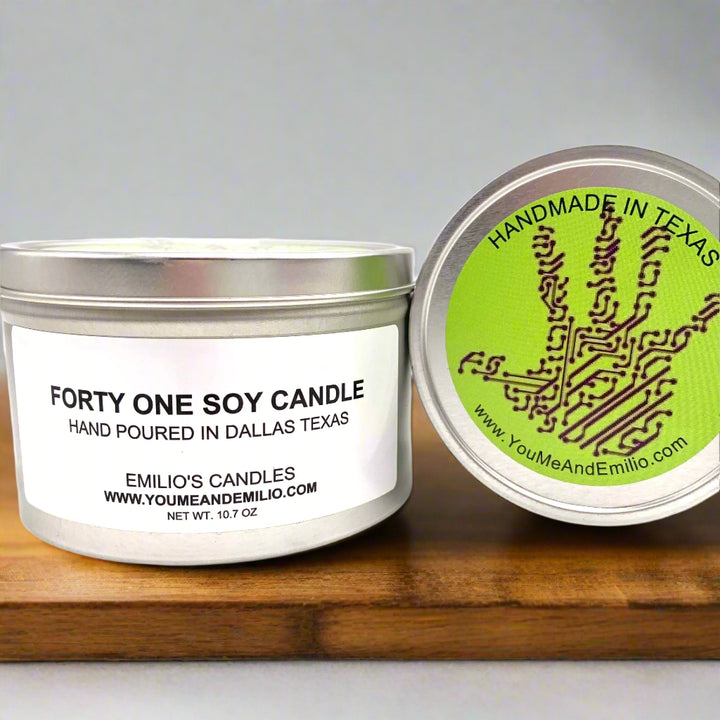 FORTY-ONE Soy Candle

Indulge in the luxurious FORTY-ONE Soy Candle, carefully crafted with a blend of mandarin, bergamot, and floral notes, heightened by warm and masculine tones. Let the sensual scents of rosewood, amber, and musk transport you to a world of sophistication and elegance.