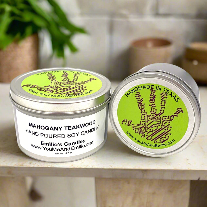 A flat lay of the Mahogany Teakwood Soy Candle in its packaging, accompanied by eco-conscious decor items like recycled coasters and natural elements, showcasing its handmade and toxin-free features.