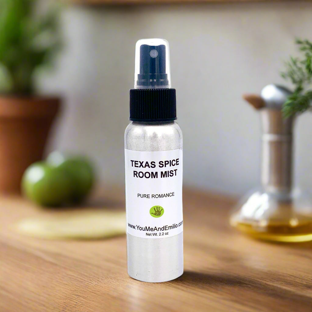 Hand holding Texas Spice Room Mist, spraying into a sunlit living room.

