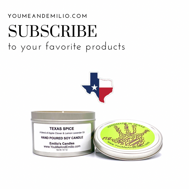 Texas Spice Soy Candle displayed alongside fresh apples, clover, lemons, and lavender, representing its natural ingredients.