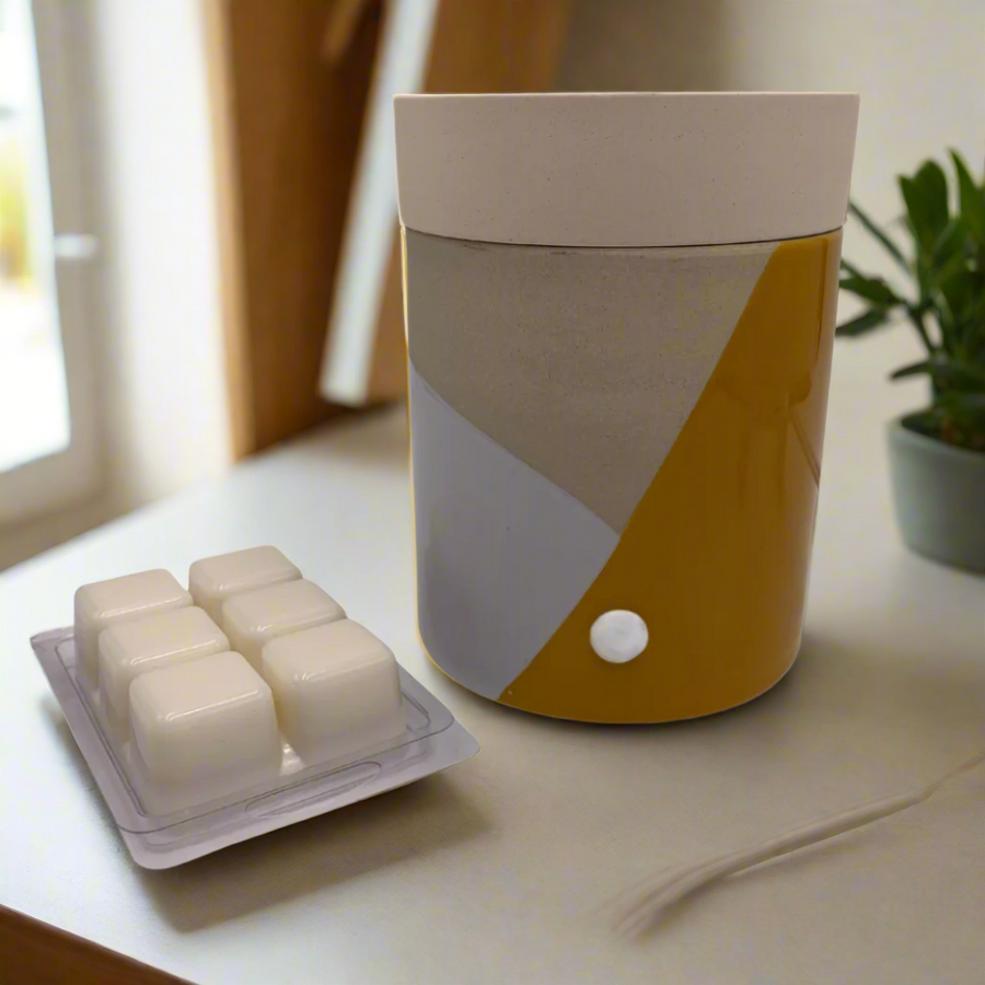 Yellow Soy Wax Warmer

Introducing our Yellow Soy Wax Warmer, designed to transform your home into a haven of captivating scents. This wax warmer features the irresistible fragrance of You Me &amp; Emilio, creating a truly sensorial experience in your space.