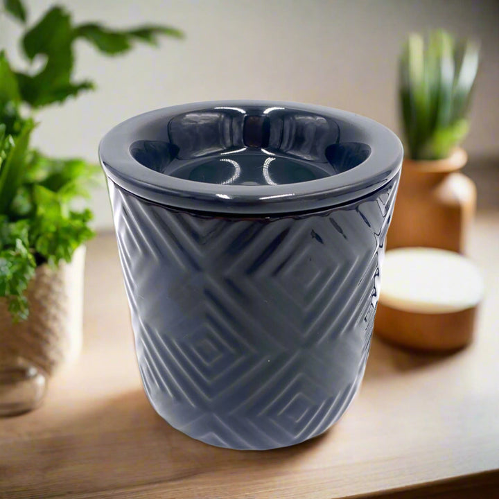 Soy Wax Warmer

Our Soy Wax Warmer is a versatile and convenient way to enhance your space with delightful fragrances. This electric wax warmer is designed to warm candles or melt soy wax cubes, providing you with an enriching sensory experience.