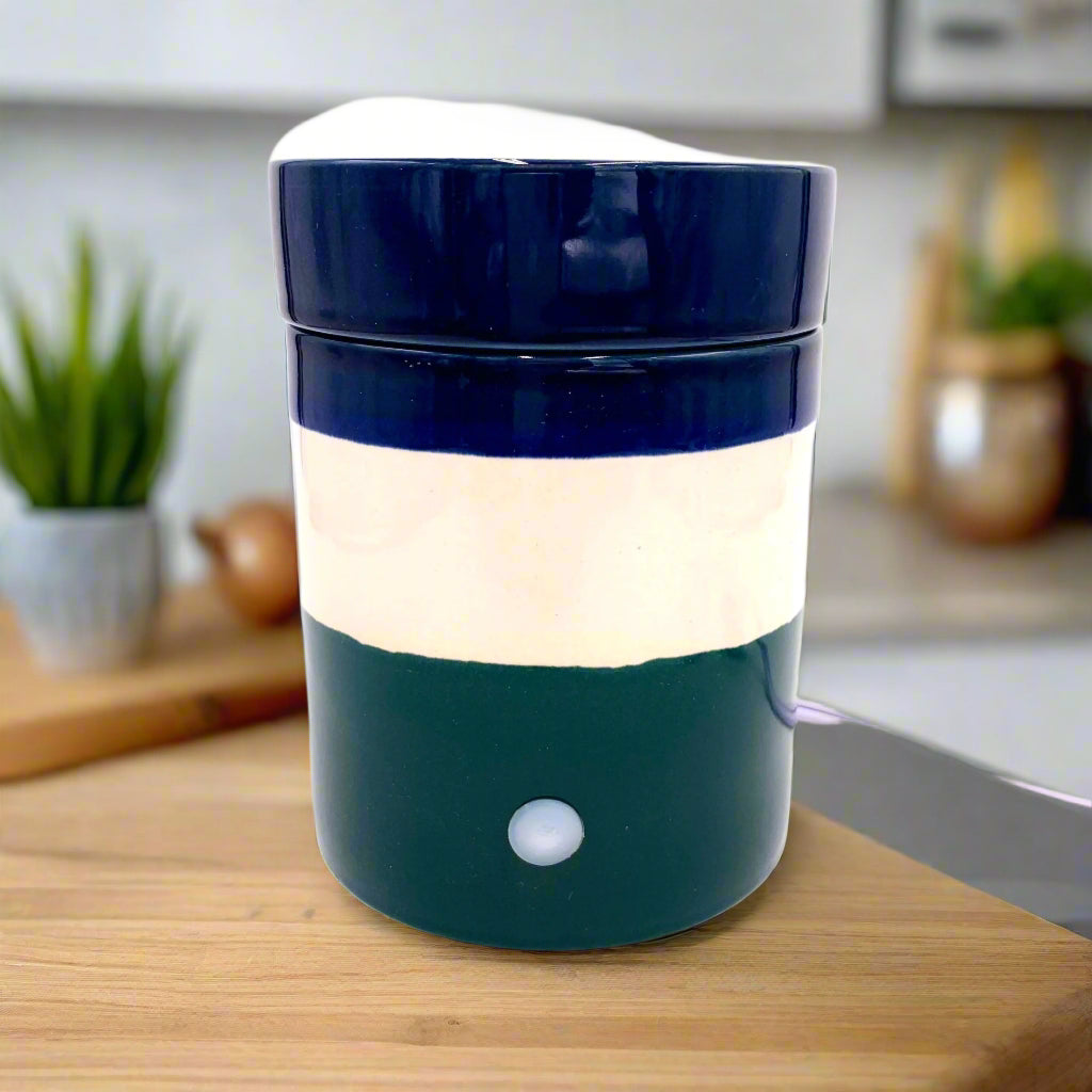 Fragrance & Soy Wax Warmer

Elevate the ambiance of your living space with our Fragrance Soy Wax Warmer. Delight in the luxurious scent of "You Me &amp; Emilio" as it fills the air, creating an atmosphere of elegance and exclusivity.